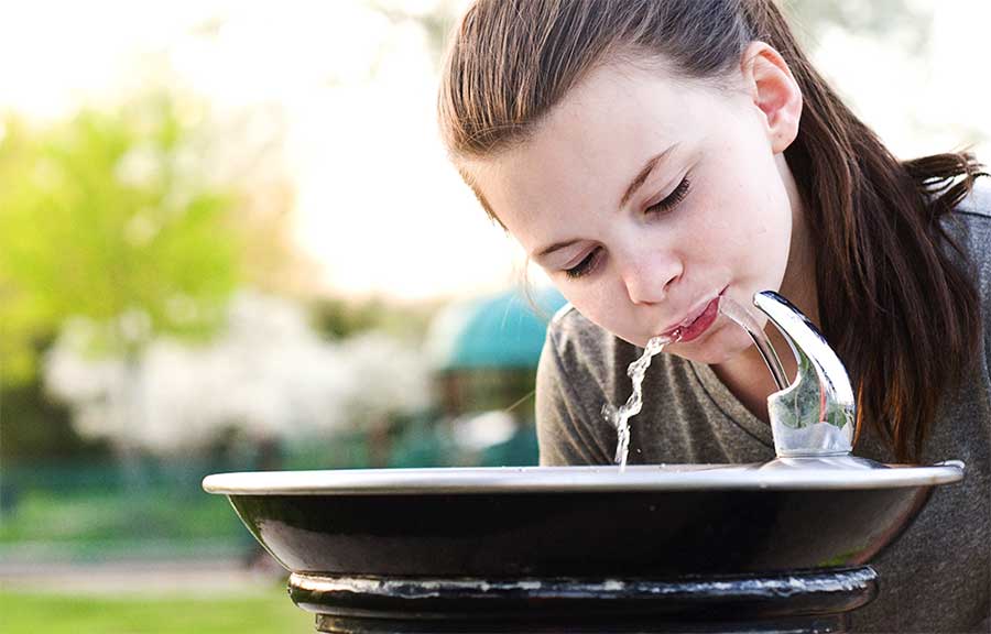 Child drinking water.